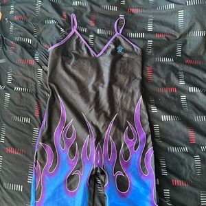 This is a medium romper with blue and purple flames